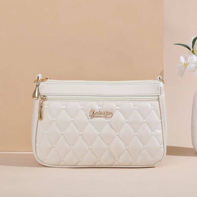 Embroidered Leather Messenger Bag for Women | Stylish Ladies Crossbody Handbag with Hair Ball Charm