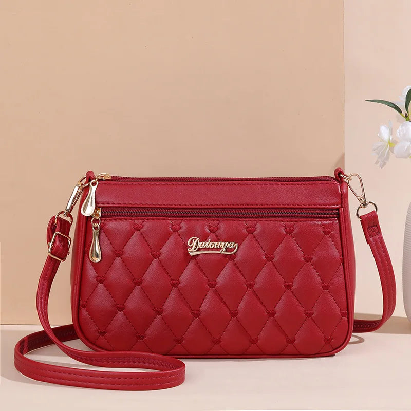 Embroidered Leather Messenger Bag for Women | Stylish Ladies Crossbody Handbag with Hair Ball Charm
