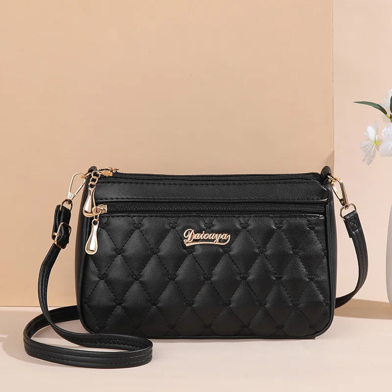 Embroidered Leather Messenger Bag for Women | Stylish Ladies Crossbody Handbag with Hair Ball Charm